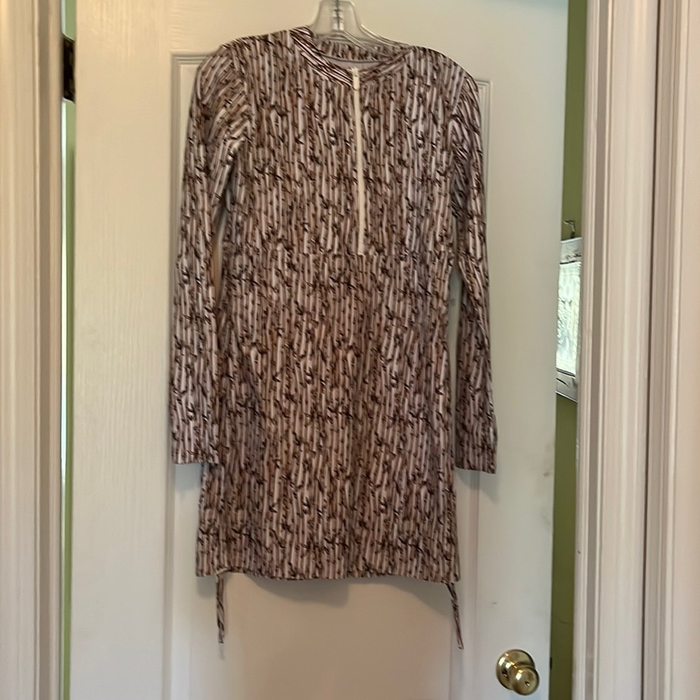 Unique and stylish long-sleeved rash-guard dress.